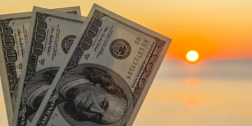 Como se diferencia o dólar turismo do dólar comercial?