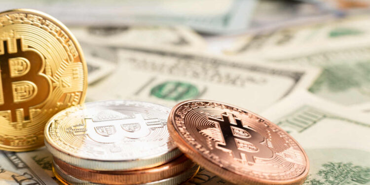 Bitcoin registra ligeira valorização e retoma o patamar dos US$ 100 mil, de olho na decisão do Fed