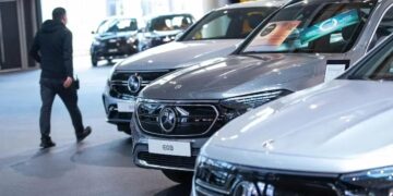 Mercedes-Benz electric vehicles inside a Mercedes-Benz AG showroom in Berlin, Germany, on Tuesday, Feb. 24, 2022. Mercedes-Benz expects profitability at its main cars division to slip this year as the German manufacturer sees more drag from supply-chain snarls and a surge in raw-material costs.