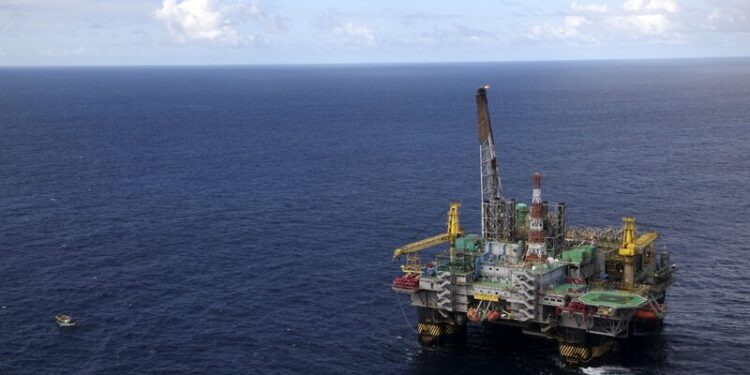 Como as Grandes Petrolíferas Lucram em Dobro com a IA — Utilizando e Fornecendo