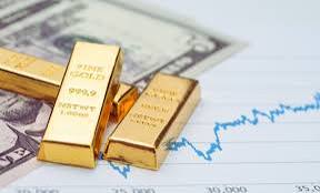 Ouro cai quase 1% em atenção ao Fed